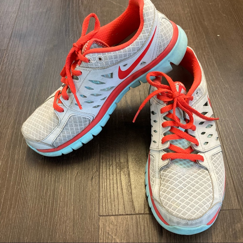 Nike light blue and orange cross trainers